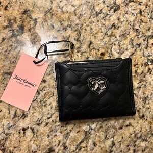 Juicy Couture Flawless Bifold with Pullout Card Case in black.
